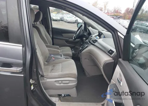 2016 Honda Odyssey Se z USA, uszkodzony, nr VIN 5FNRL5H37GB113532